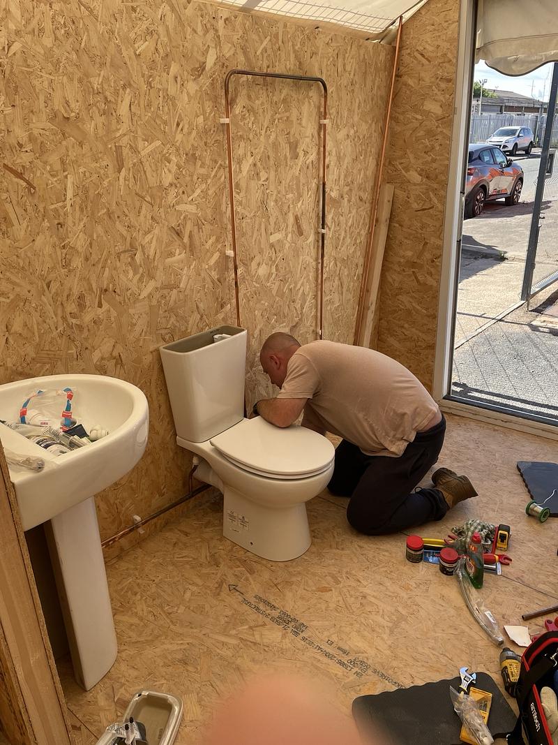 Learner installing bathroom pipework on the 5-Day Bathroom Fitting Course